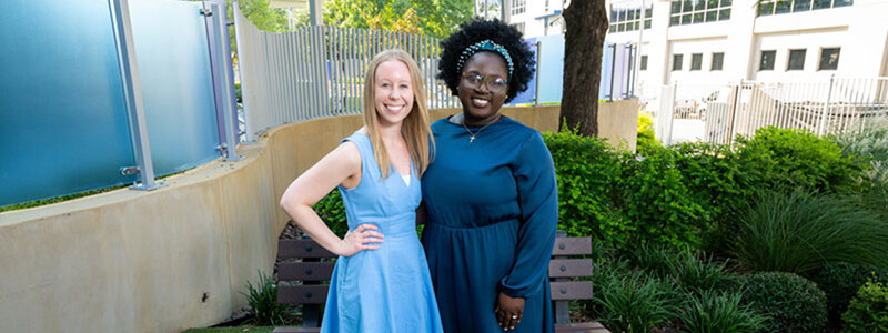 women smiling and posing for a picture